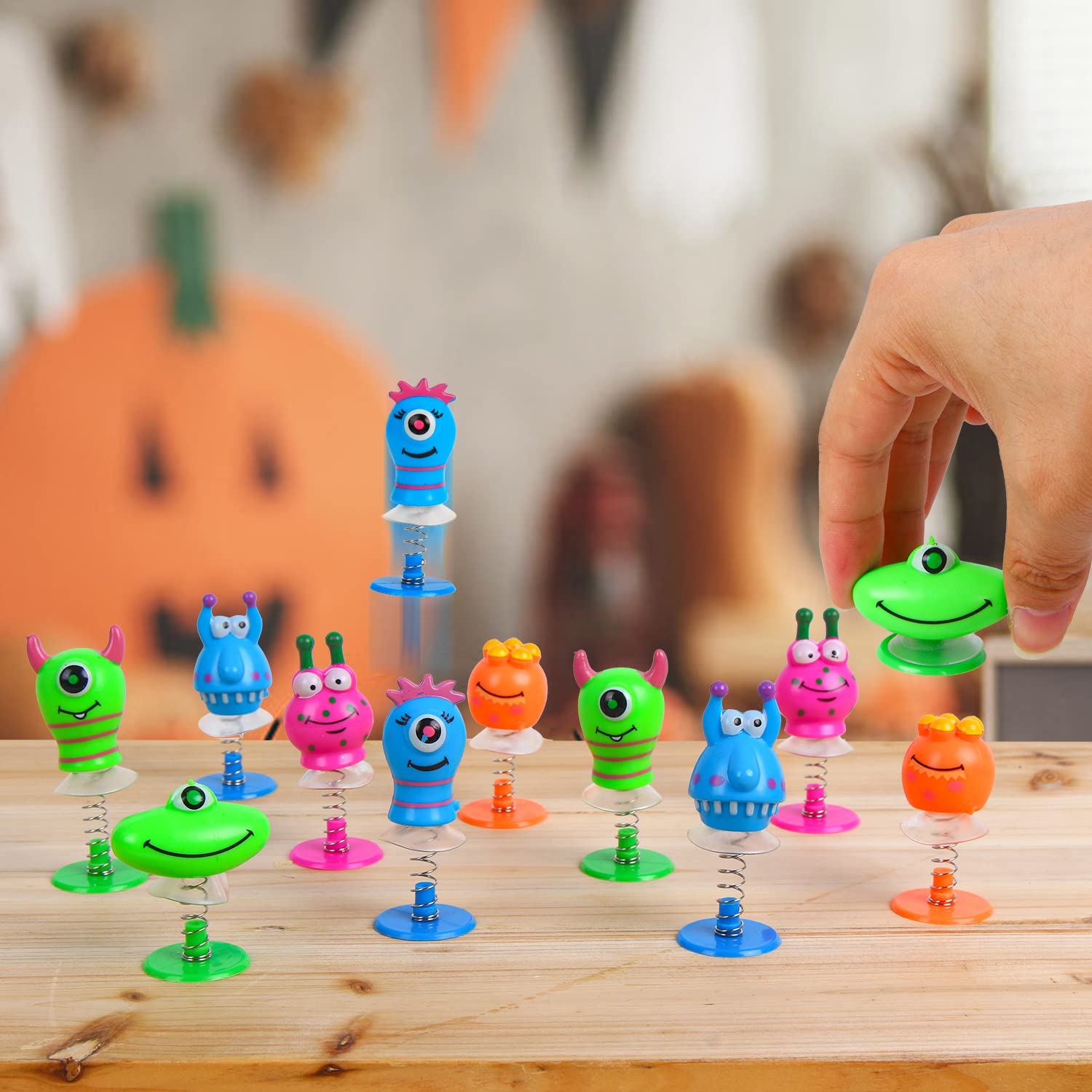 VEYLIN Monster Jump, 18PCS Assorted Novelty Monster Spring Jump Up Party Favor Toys Kids Classroom Prizes