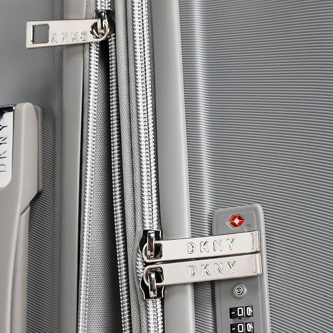 DKNY Charm Silver Luggage Expandable Lightweight Spinner Suitcase with TSA Lock Luggage