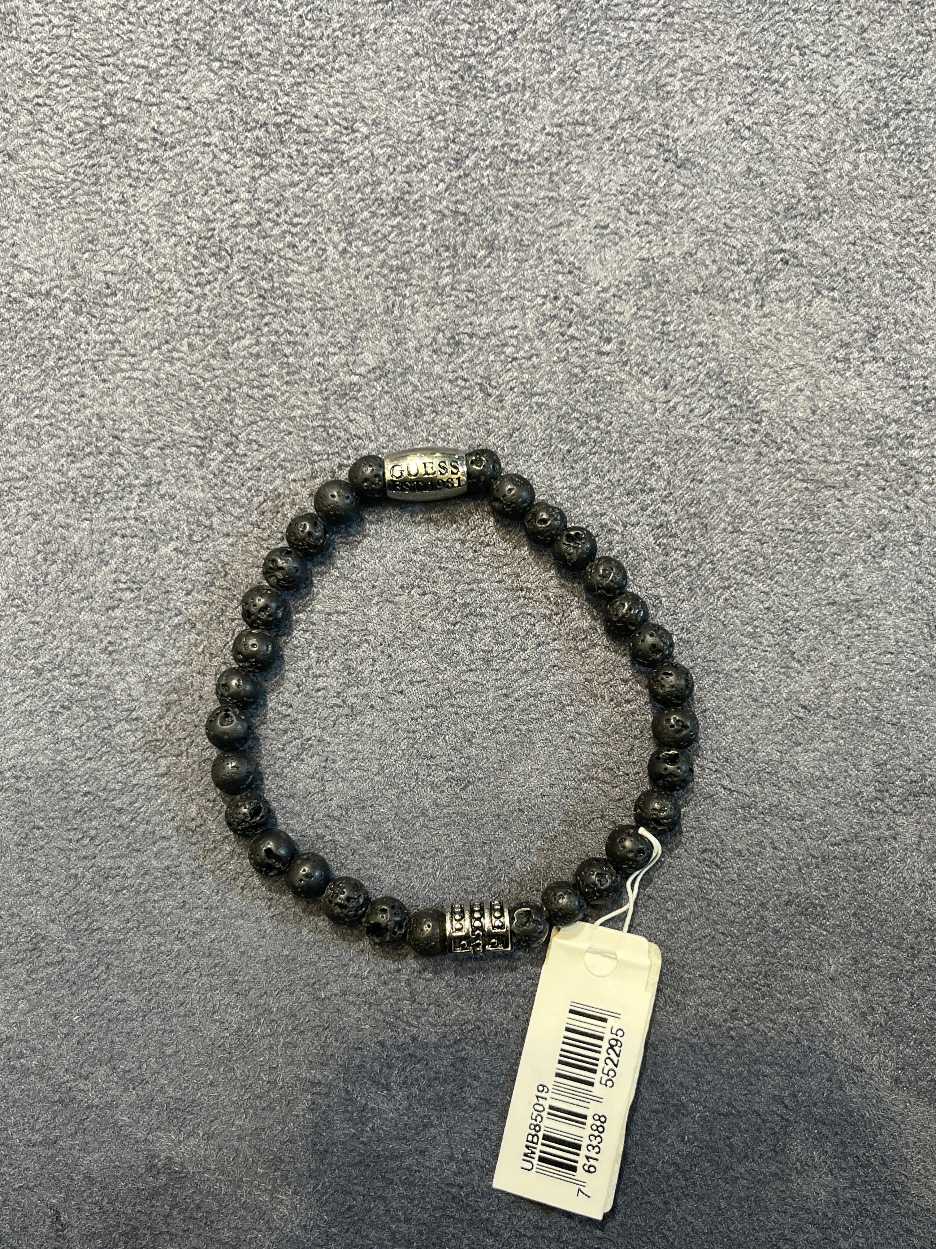 GUESS Black Lava Stone Logo Stretch Bracelet