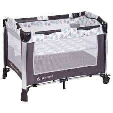 Baby Trend GoLite ELX Nursery Center in the Drip Drop Blue pattern featuring a removable bassinet and changing table