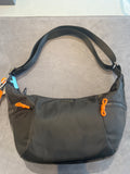 Black Nylon Crescent Crossbody Bag with Orange Pull Accent