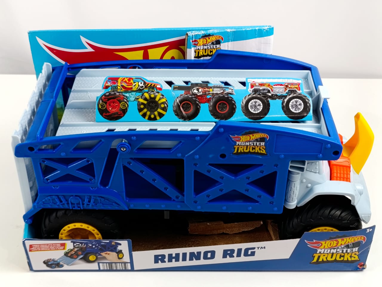 Hot Wheels Monster Trucks Monster Mover Rhino, Toy Car Hauler, Holds 12 1:64 Scale Monster Trucks or 32 Hot Wheels, with Ramp Launch, Gift for Kids 3 Years & Up, Multi