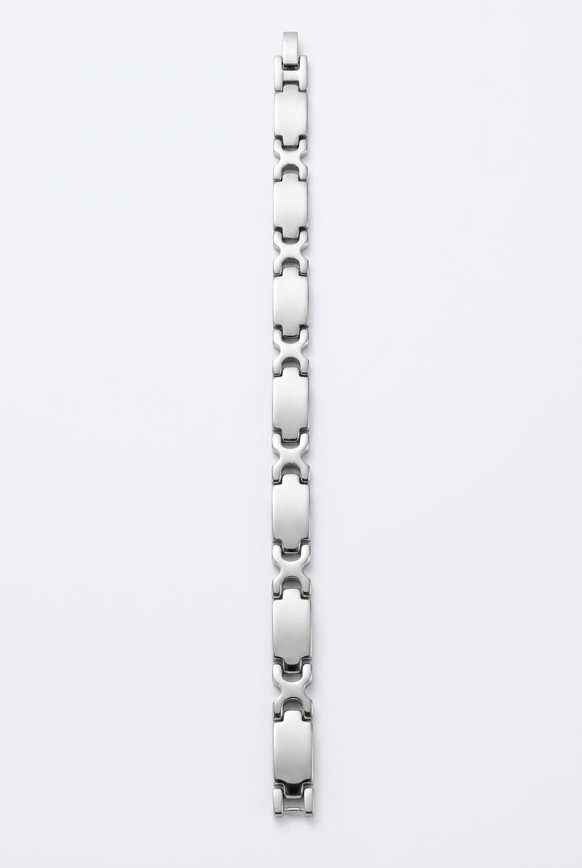 All-silver chain bracelet on a white studio background