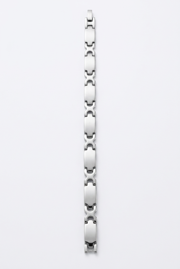 All-silver chain bracelet on a white studio background
