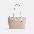 حقيبة يد كبيرة من قماش Coach Signature من Coach بسحاب علوي