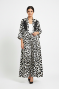 Elegant Woman in White Leopard Co-ord