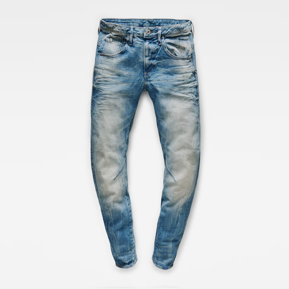 Front view of medium blue boyfriend jeans with a skinny fit and distressed look on a transparent background.
