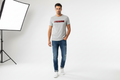 grey GUESS tee with the bold red logo
