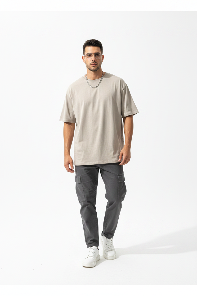 Man wearing beige oversized tee