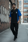 Man Wearing Black Blue Colorblock Tee