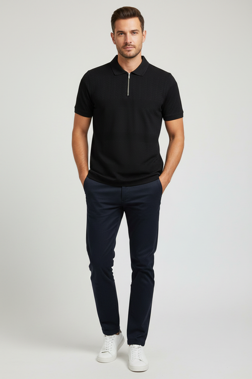 Man wearing black polo