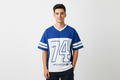Man wearing Blue 74 Jersey