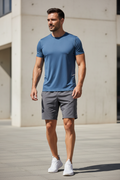 Man wearing blue tee front