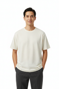 Man wearing cream t-shirt