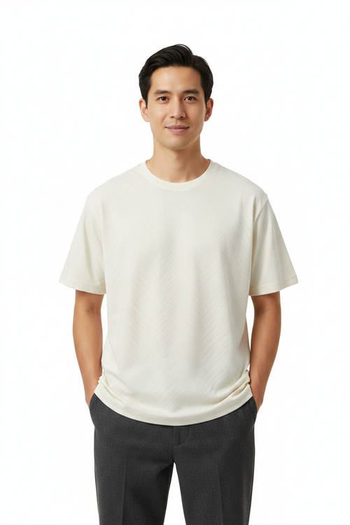 Man wearing cream t-shirt