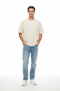 Man wearing cream t-shirt