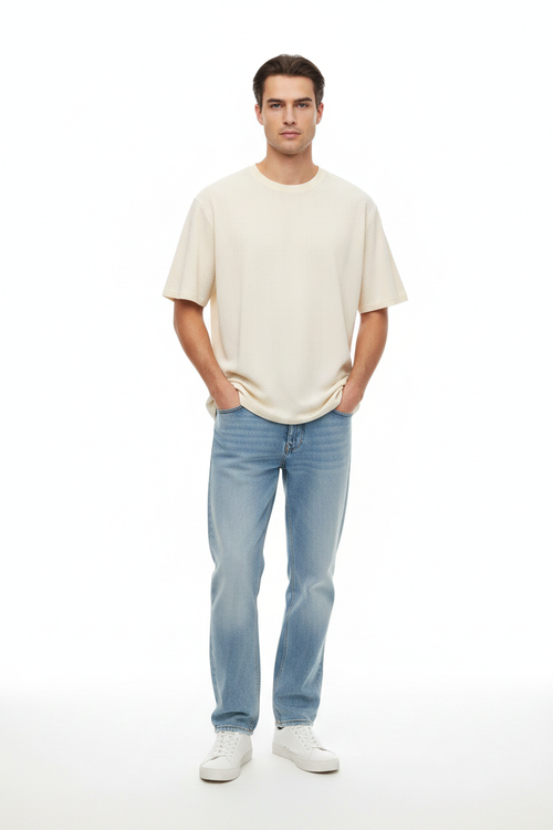 Man wearing cream t-shirt