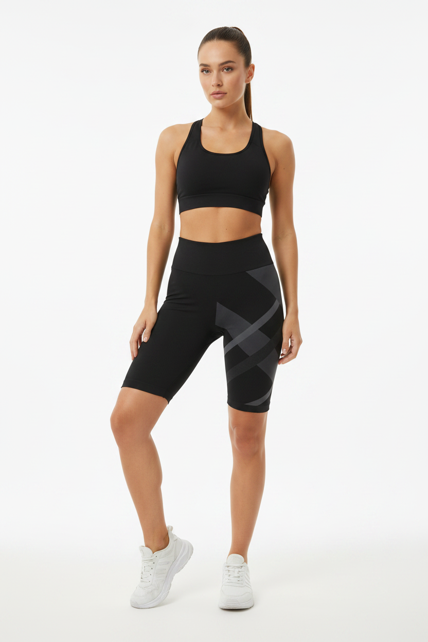 Model wearing black X-pattern bike shorts