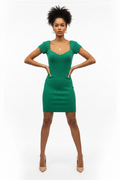 Model wearing green ribbed dress