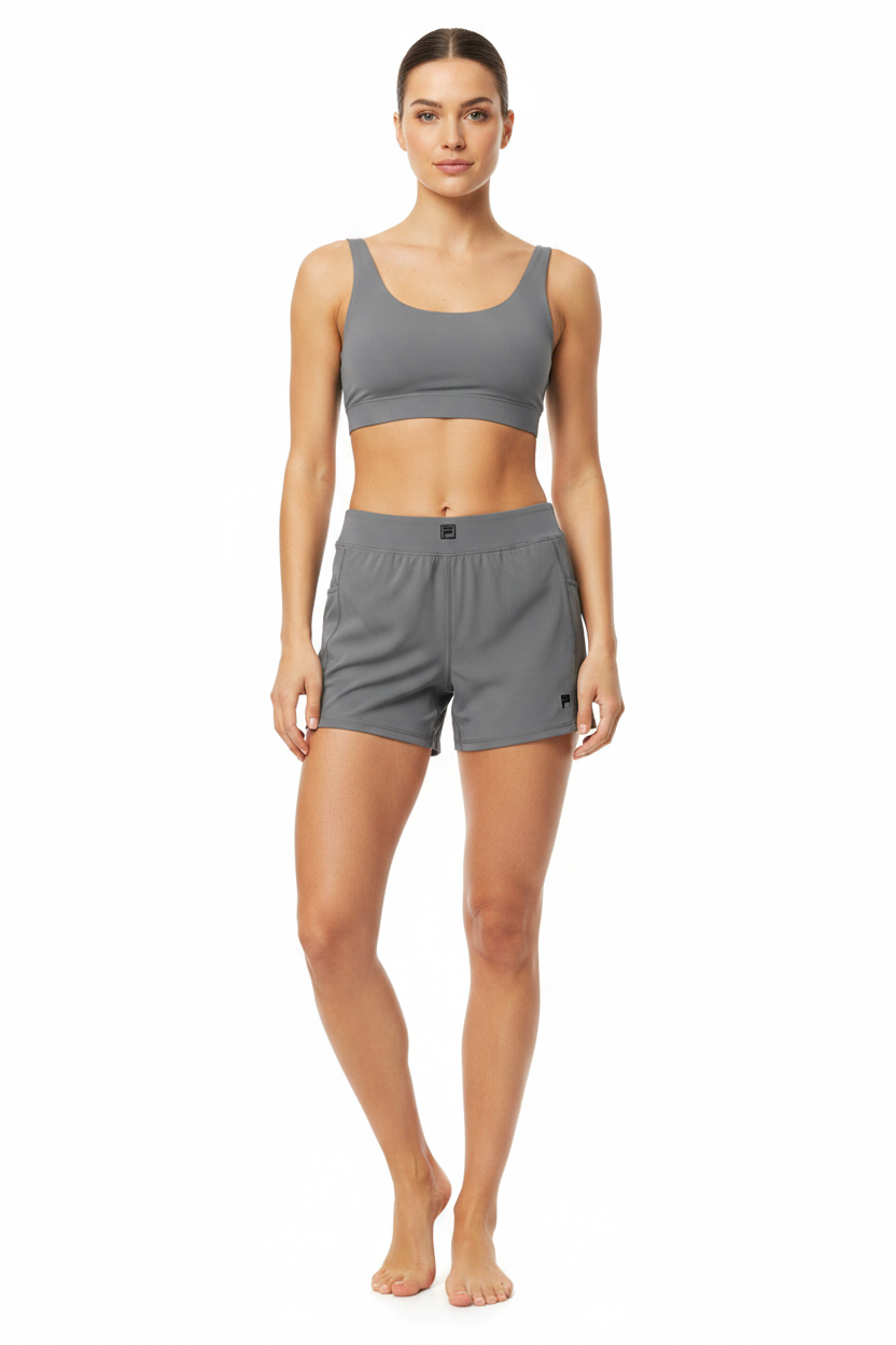 Model wearing grey shorts
