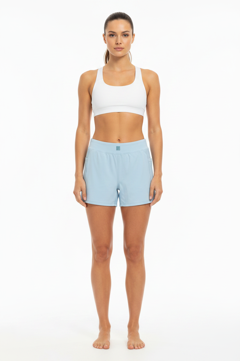 Model wearing light blue shorts