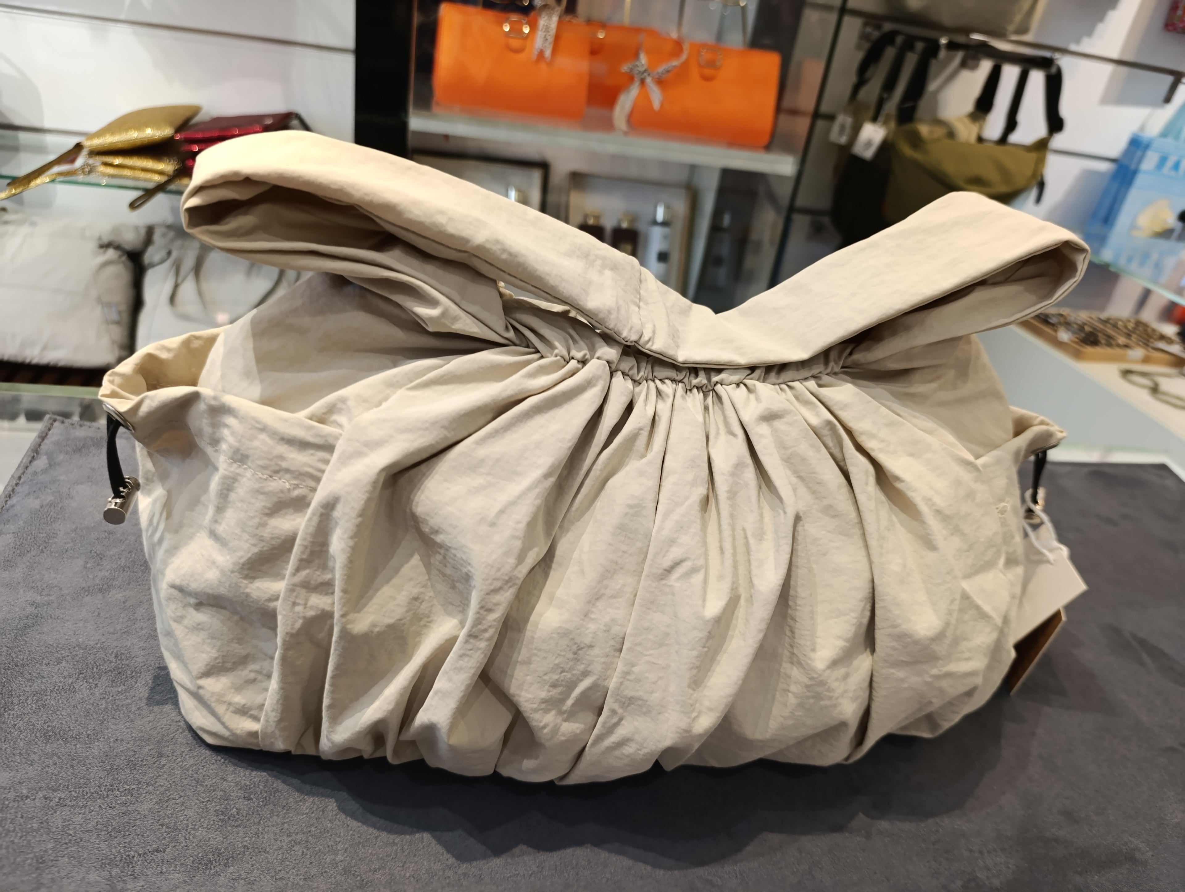 beige women's handbag