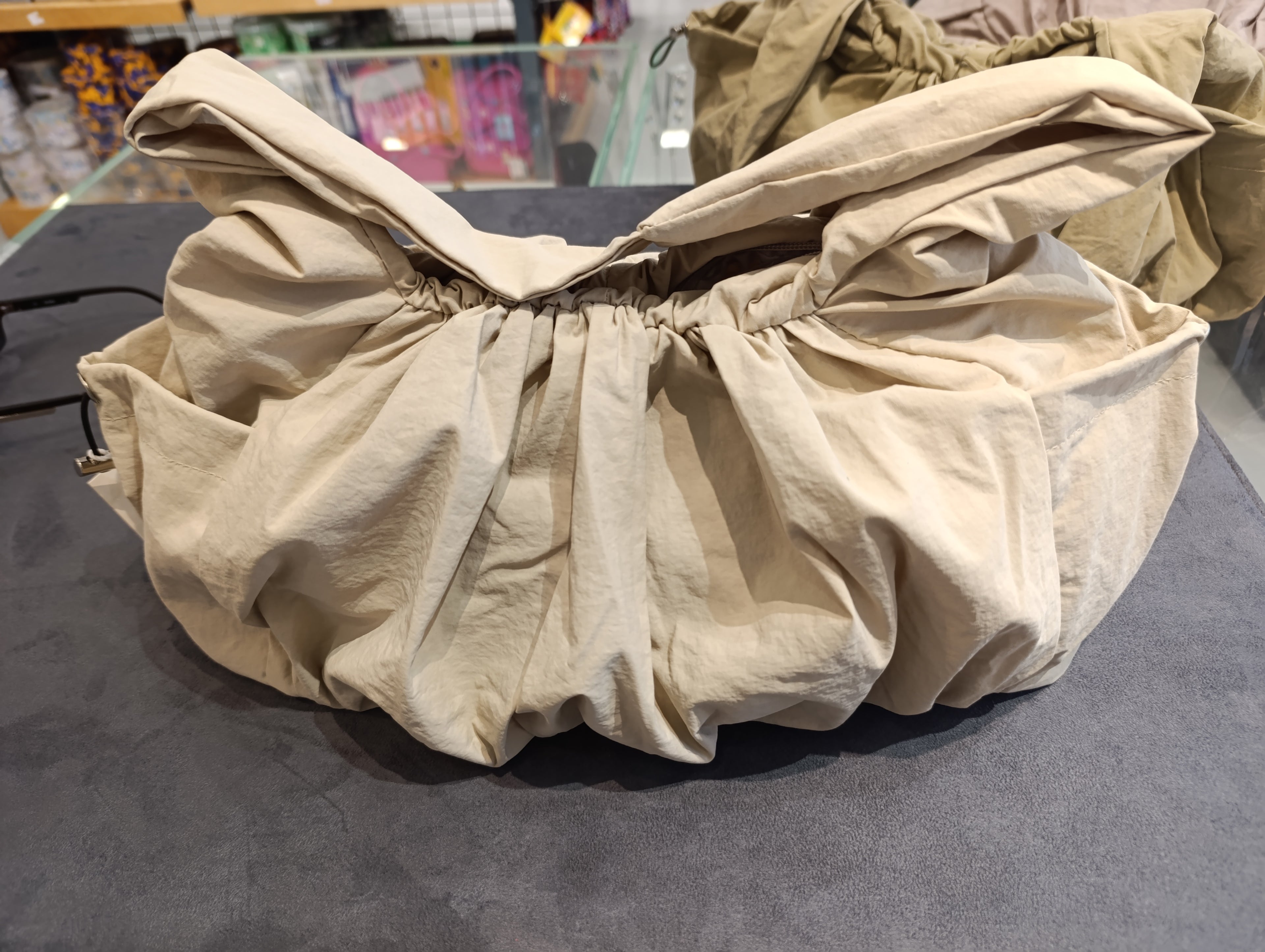 beige women's handbag