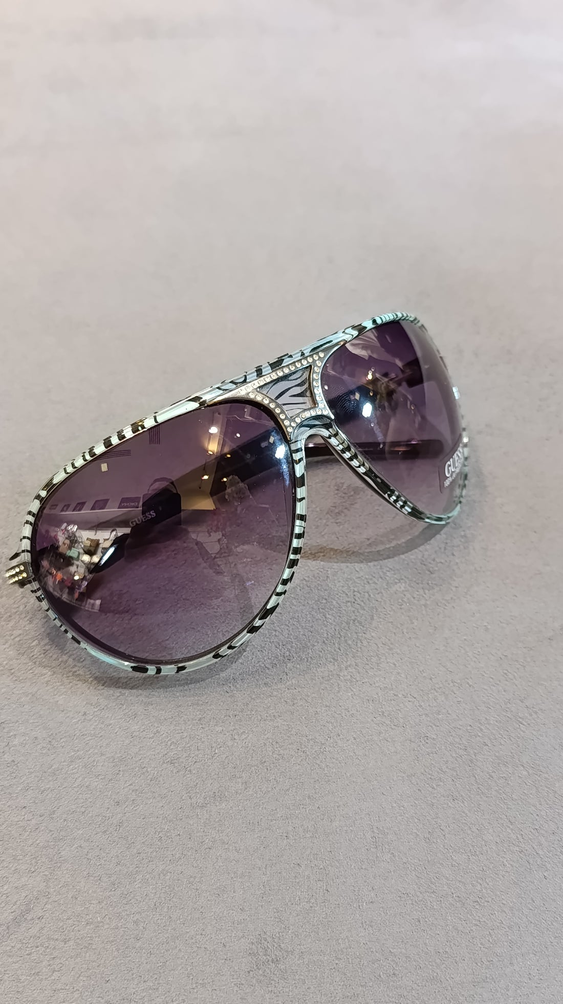 Guess GU7014-TQZB-35 Sunglasses – Turquoise Zebra / Crystal G / Smoke Gradient