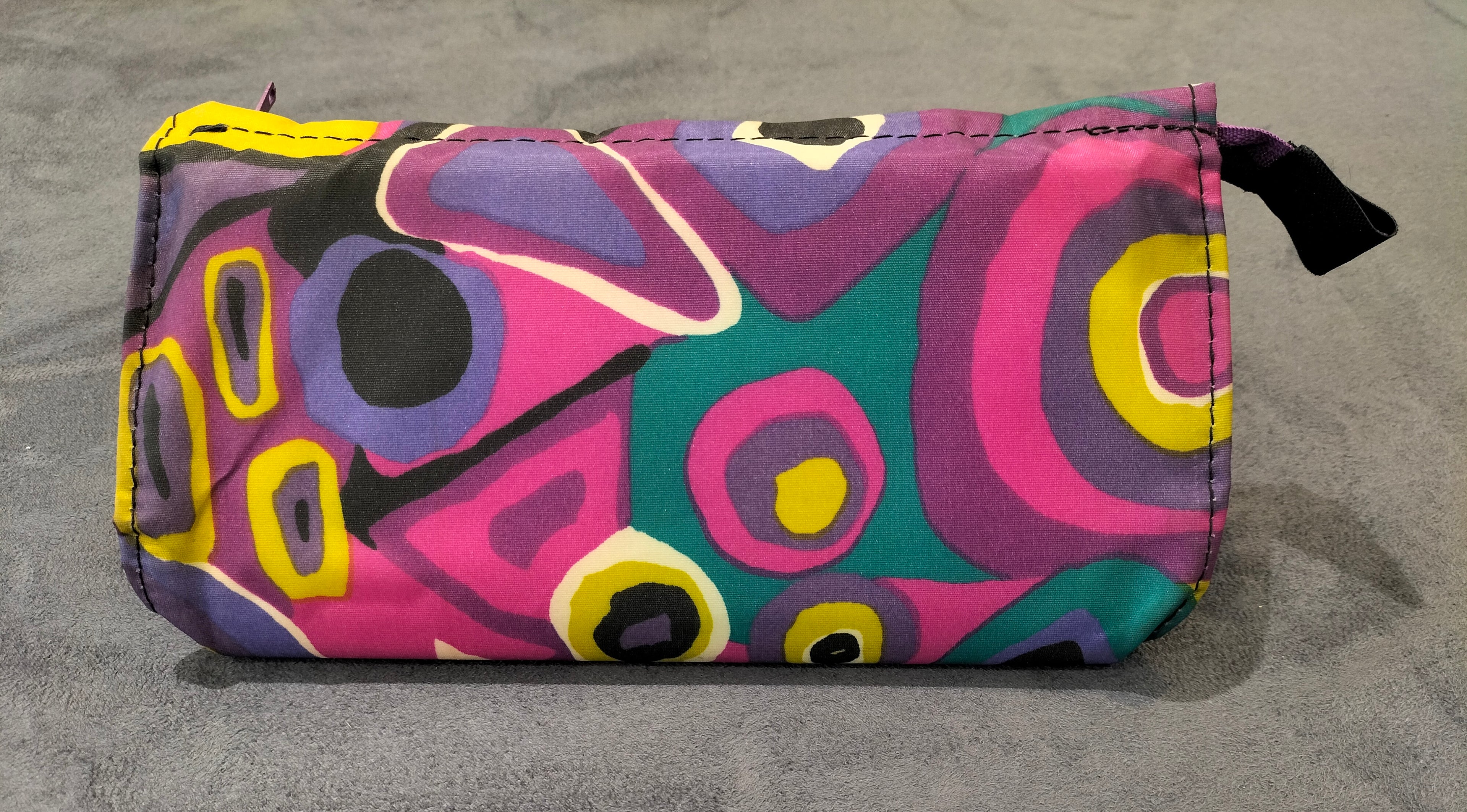 Zippered Cosmetic Pouch with Vibrant Abstract Patterns