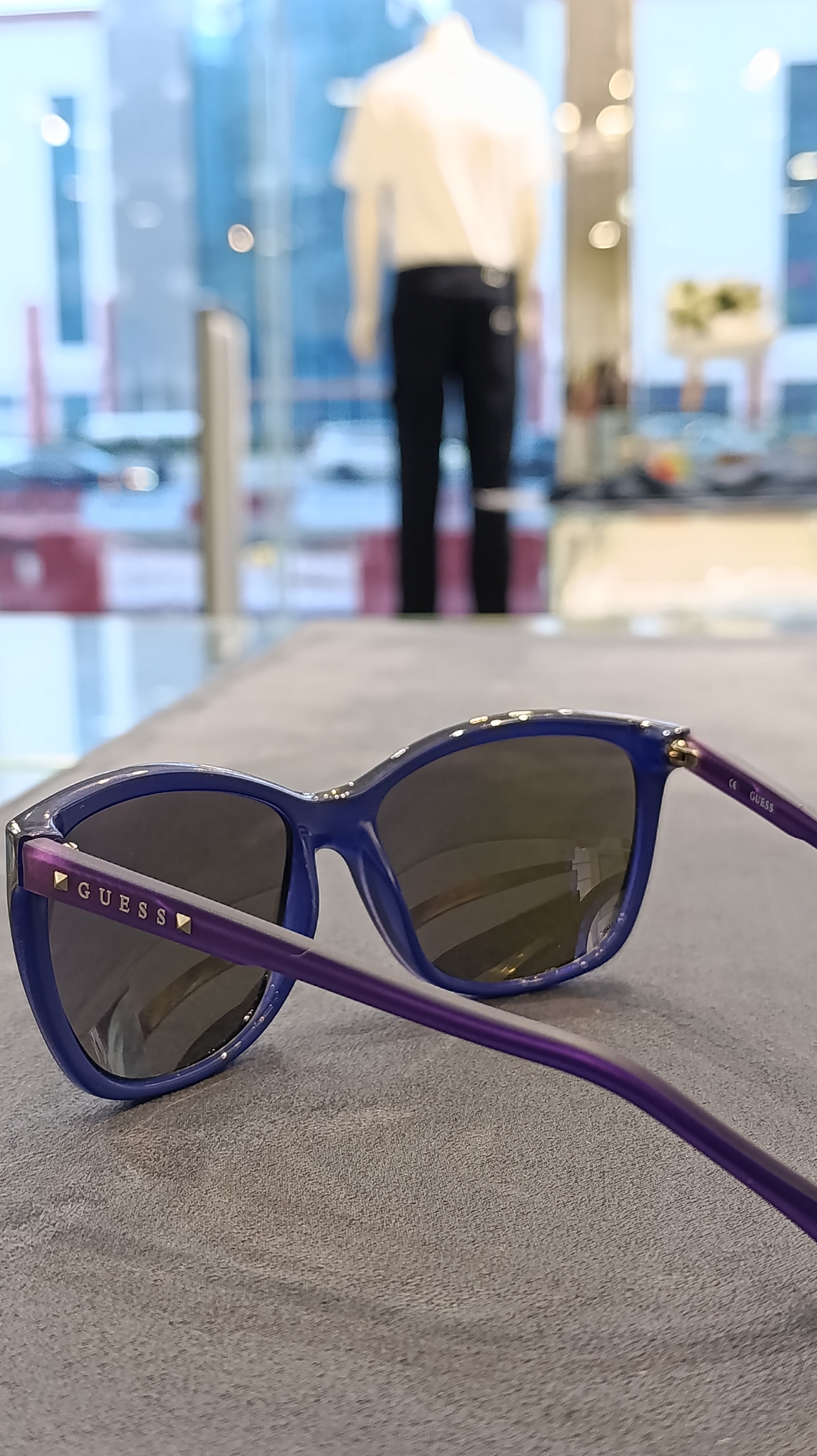 GUESS Square Sunglasses with Purple Temples and Blue Lenses