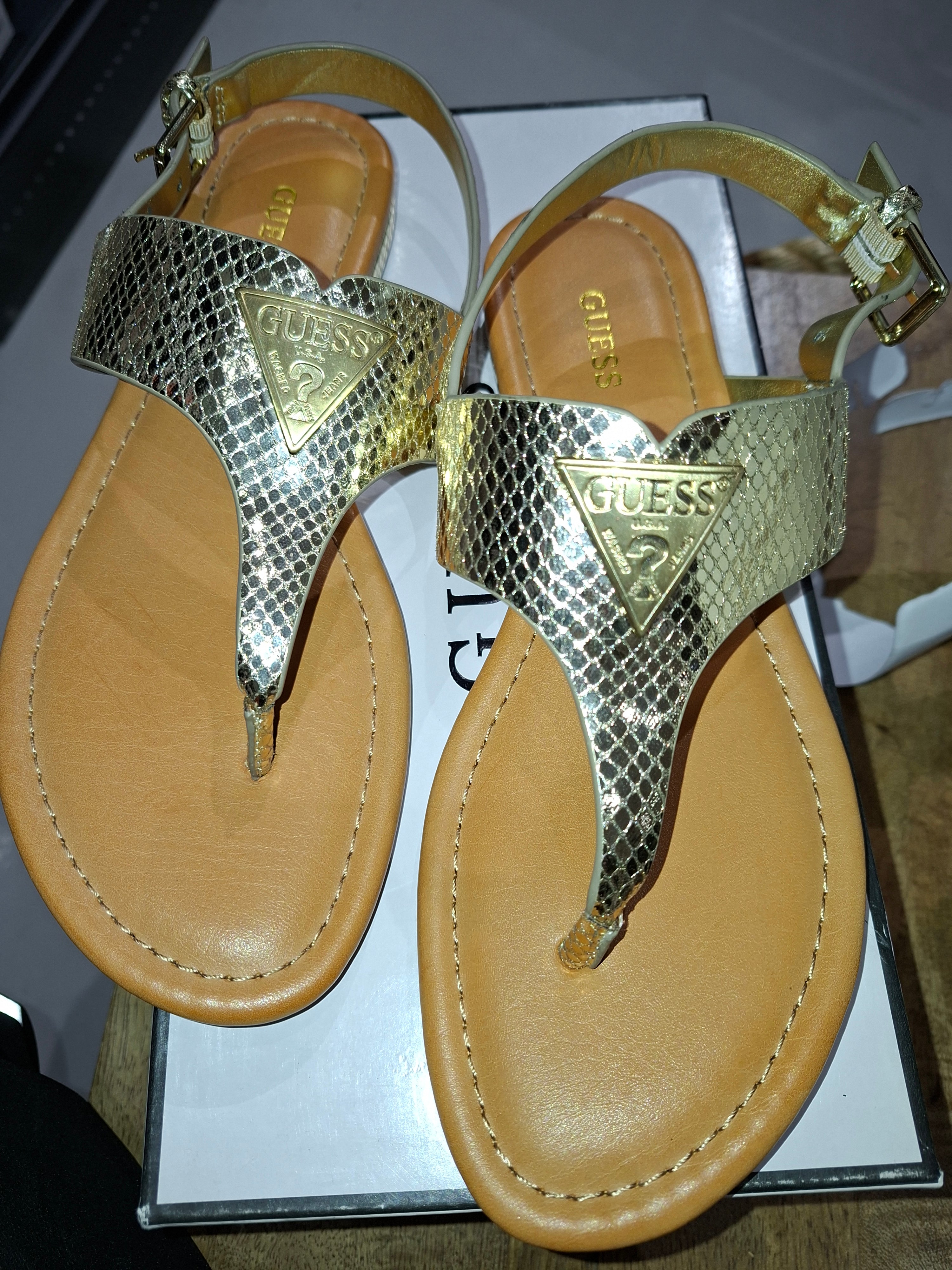 GUESS WOMENS SANDAL- gold color
