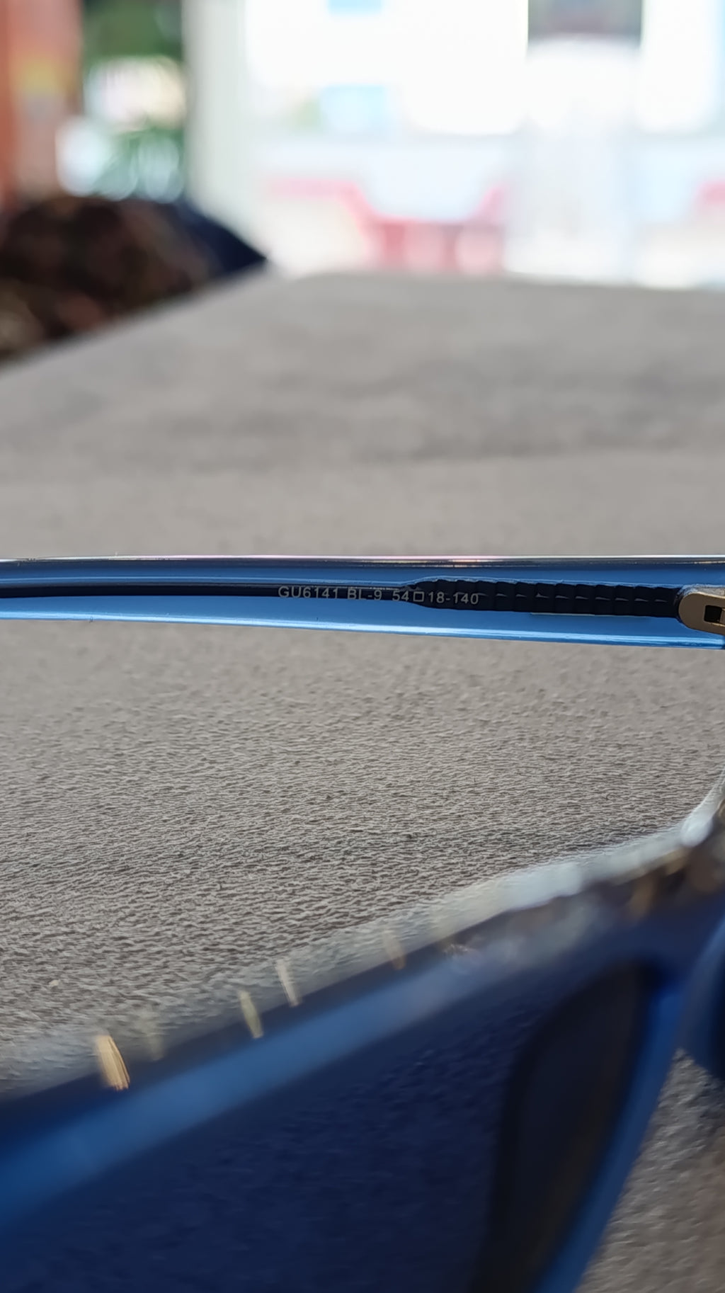 GUESS Blue Oval Sunglasses