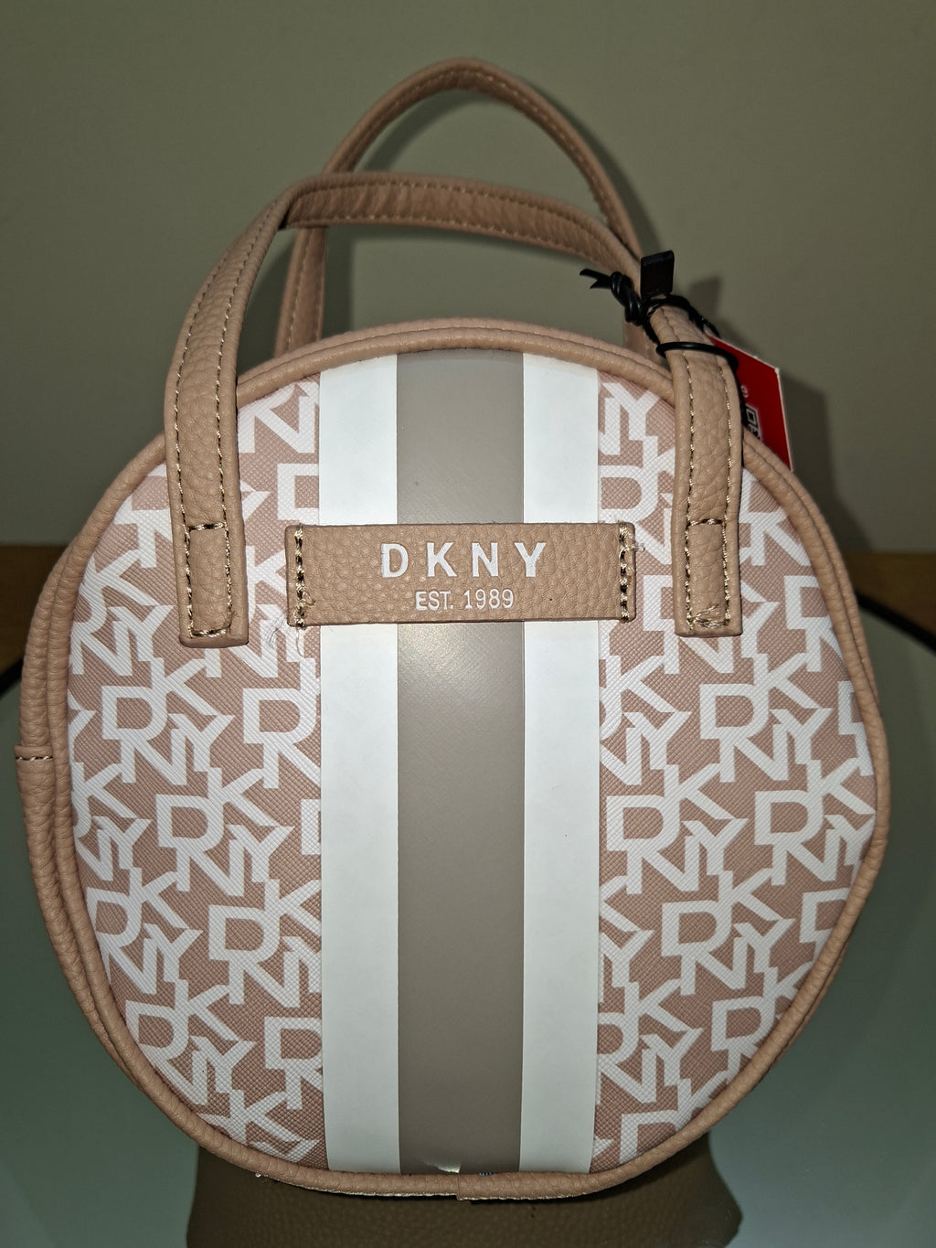حقيبة مستحضرات تجميل DKNY Signature Stripe Original Circle باللون LT Toffee optic white stone