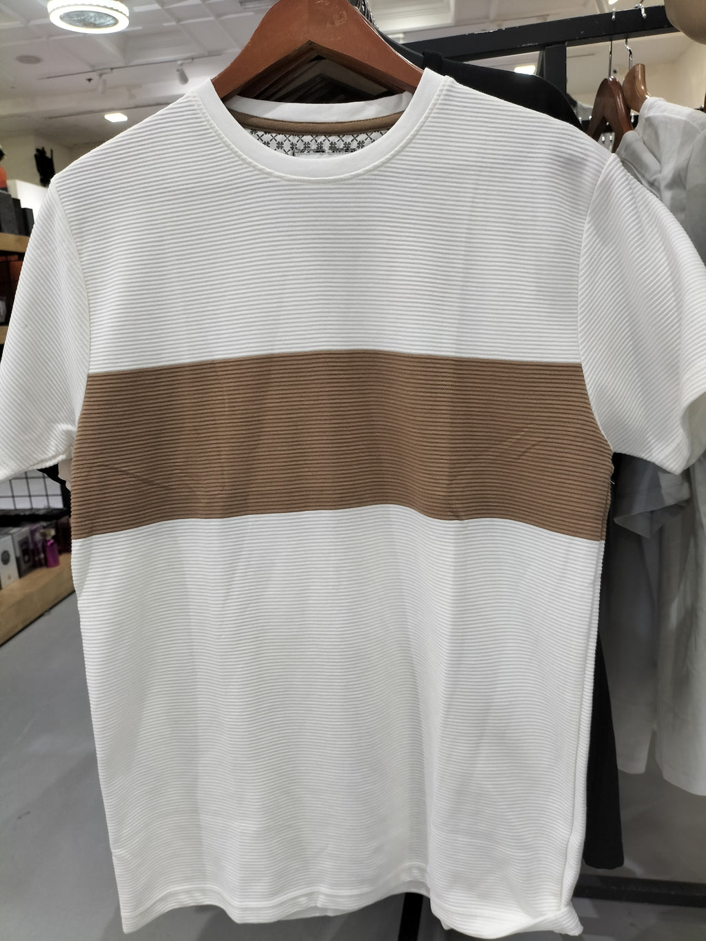 Cactus Man Ricky Singh White T-Shirt with Brown Line Across