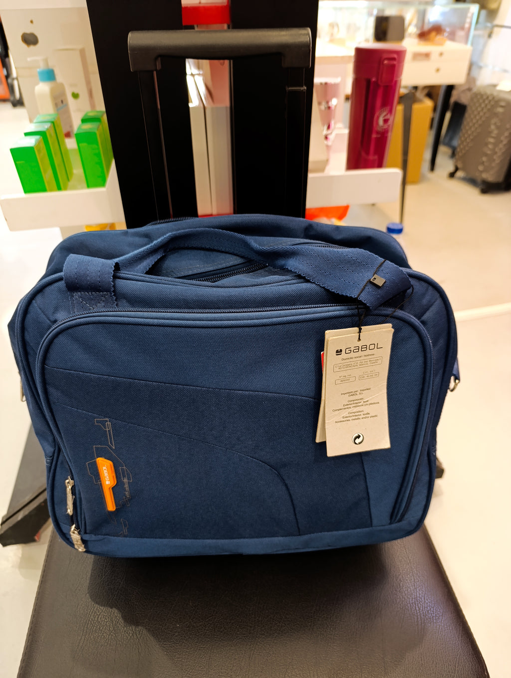 Medium-sized travel suitcase with wheels -GABOL