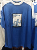 Blue and white T-shirt featuring the movie "Inception" graphic.