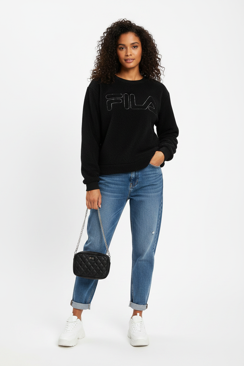 Woman wearing FILA fleece sweatshirt