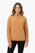 Woman wearing orange sherpa front