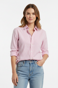 Woman wearing pink gingham shirt