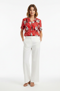 Woman wearing red floral shirt - Look 2