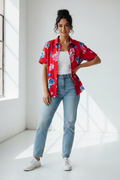 Woman wearing red floral shirt
